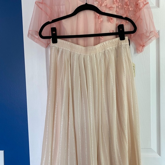 Lacy pink top over vanilla tank top with vanilla skirt. - Picture 2 of 3